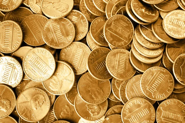 Many shiny USA one cent coins as background, top view — Stock Photo, Image