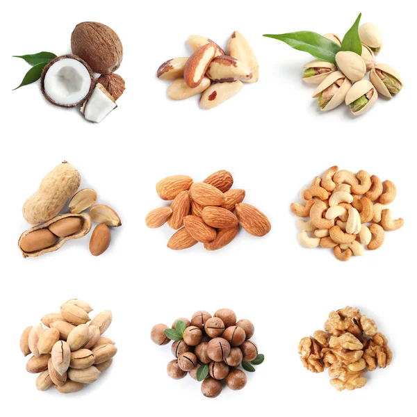 Set of different delicious organic nuts on white background, top view — Stock Photo, Image