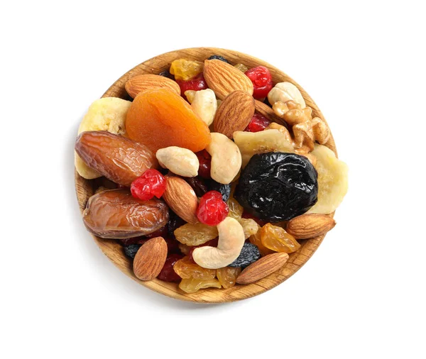 Bowl with different dried fruits and nuts on white background, top view — Stock Photo, Image