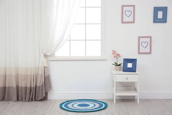 Modern window with curtain in stylish room. Home interior