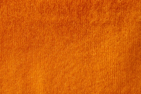 Pomarańczowy dzianin tekstury w tle, zbliżenie — Zdjęcie stockowe