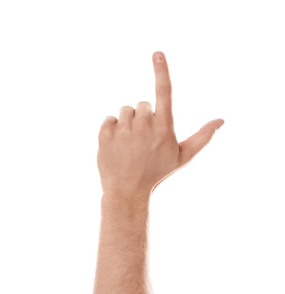 Homme pointant quelque chose sur fond blanc, gros plan de la main — Photo