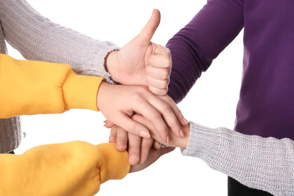 Group of people holding their hands together on white background, closeup — Stock Photo, Image