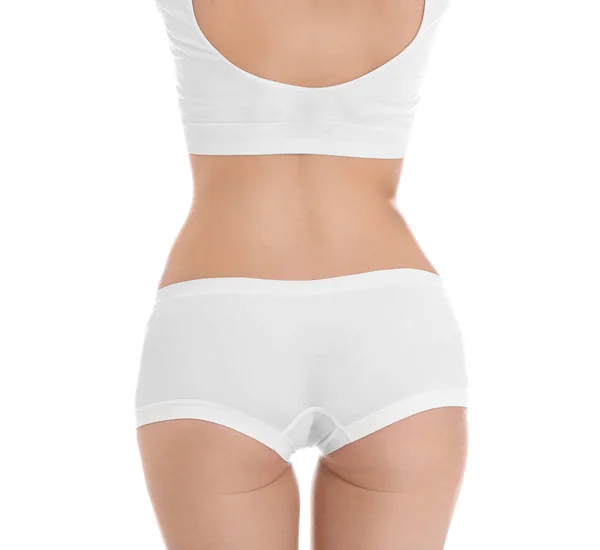 Jovem mulher magra no fundo branco, close-up. Perda de peso — Fotografia de Stock
