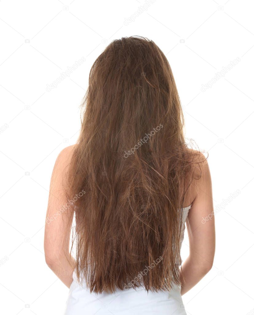 Woman with tangled brown hair on white background
