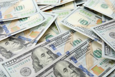 Arka plan olarak birçok Doları banknot. Amerikan ulusal para birimi