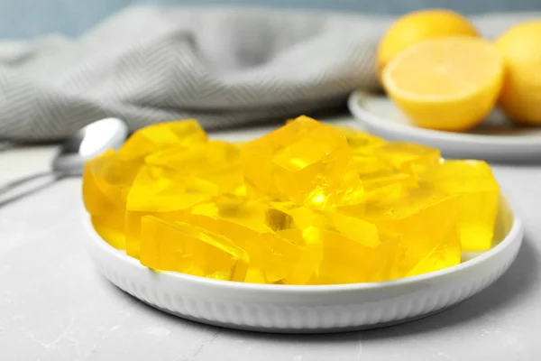 Plate with delicious lemon jelly on table, closeup — Stock Photo, Image