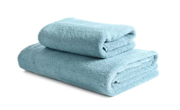 Folded clean soft towels on white background — Stock Photo, Image