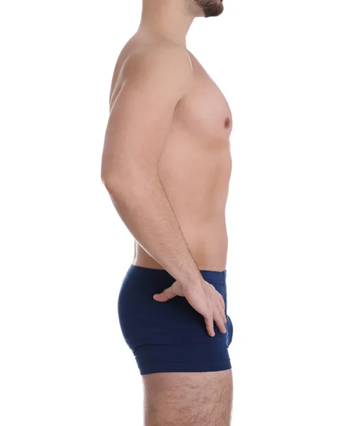 Junger Mann auf weißem Hintergrund, Nahaufnahme. Gewichtsverlust — Stockfoto
