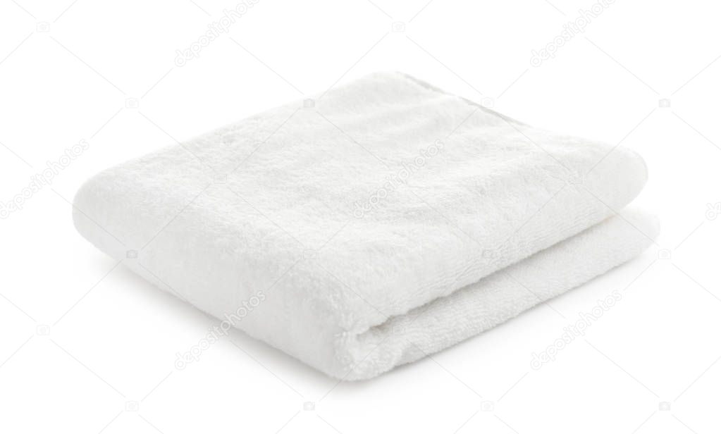 Folded clean soft towel on white background