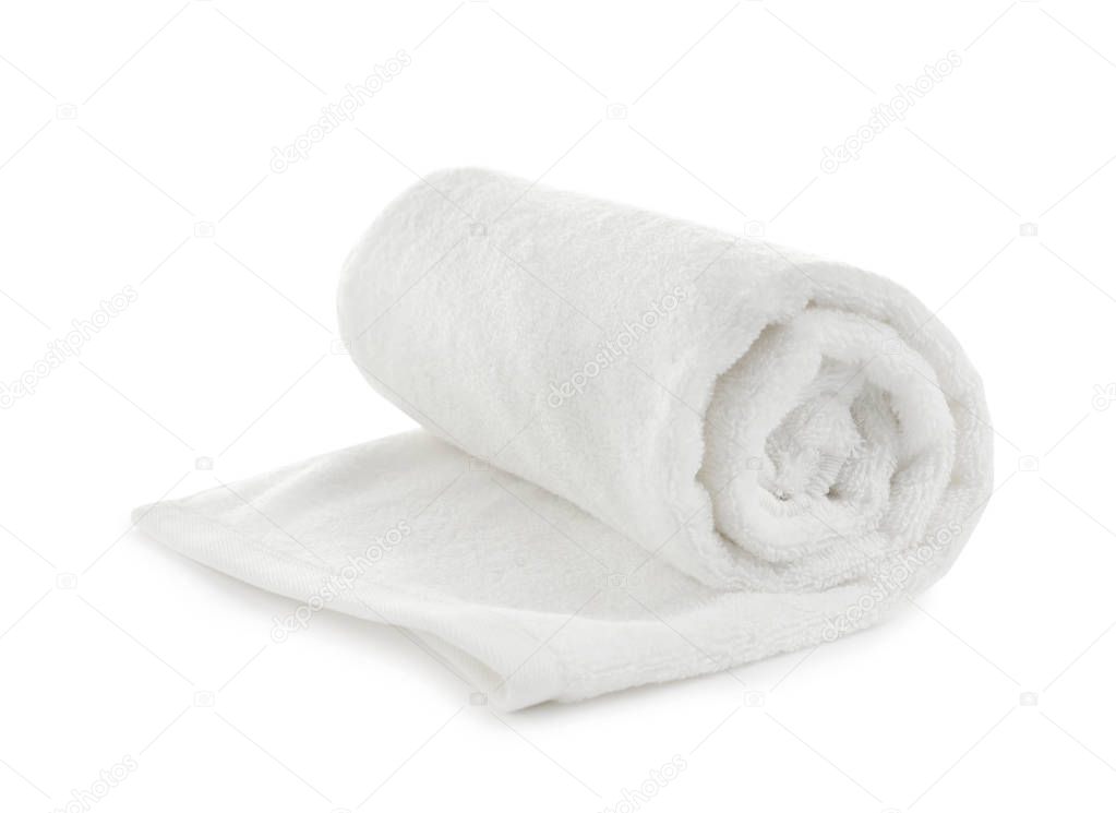 Rolled soft terry towel on white background