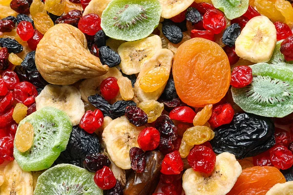 Diversi frutti secchi come sfondo, vista dall'alto. Stile di vita sano — Foto Stock