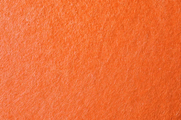 Tekstury pomarańczowy produkt jako tło, zbliżenie — Zdjęcie stockowe