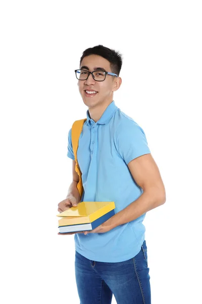 Asiatische Teenager Junge mit Büchern auf weißem Hintergrund — Stockfoto