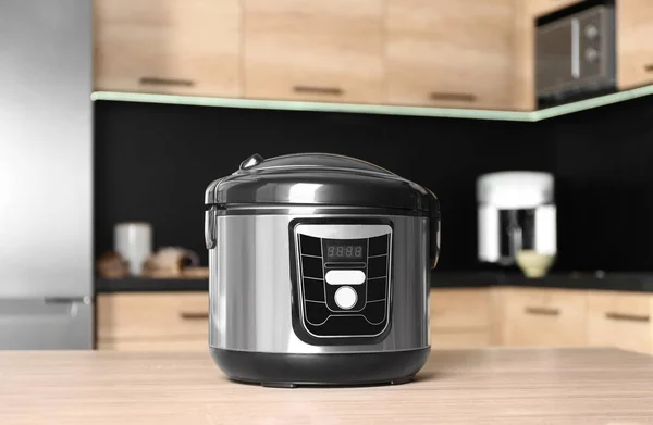Modern multi cooker on table in kitchen — Stock Photo, Image
