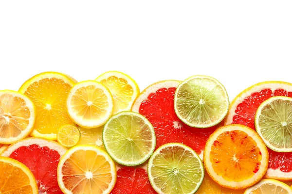 白色背景上的新鲜柑橘类水果片, 顶视图 — 图库照片
