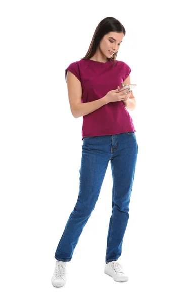 Beautiful young woman with mobile phone on white background — Stock Photo, Image