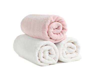 Rolled soft terry towels on white background clipart