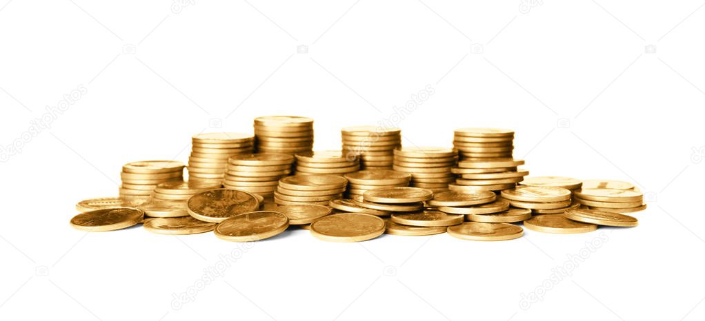 Stacks of shiny coins on white background