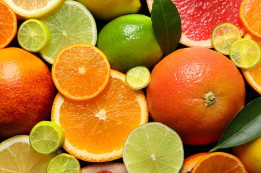 Arka plan, üstten görünüm olarak yaprakları ile dilimlenmiş ve tüm narenciye meyve