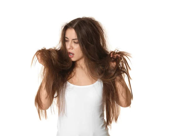 Emotional woman with tangled hair on white background — Stock Photo, Image