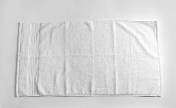 Clean soft terry towel on light background, top view — Stock Photo, Image