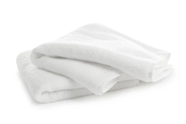 Gevouwen schone zachte handdoeken op witte achtergrond — Stockfoto