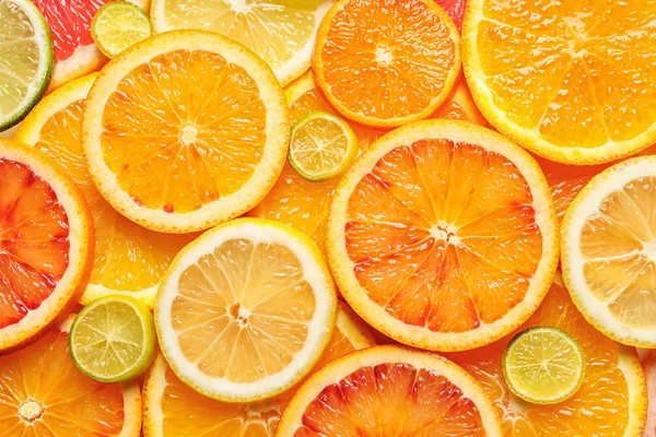 以新鲜柑橘类水果片为背景, 最受关注 — 图库照片