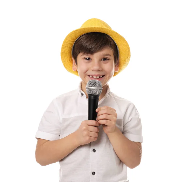 Söt liten pojke med mikrofon på vit bakgrund — Stockfoto