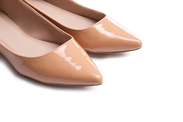 Stijlvolle vrouwelijke platte schoenen op witte achtergrond, close-up — Stockfoto
