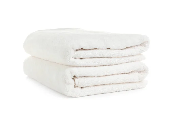 Folded clean soft towels on white background — Stock Photo, Image