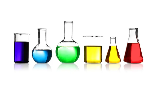 Laboratory glassware with different samples on white background. Solution chemistry — Stock Photo, Image