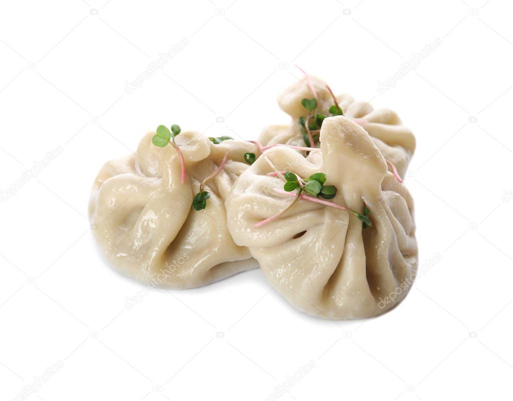 Tasty baozi dumplings with sprouts on white background