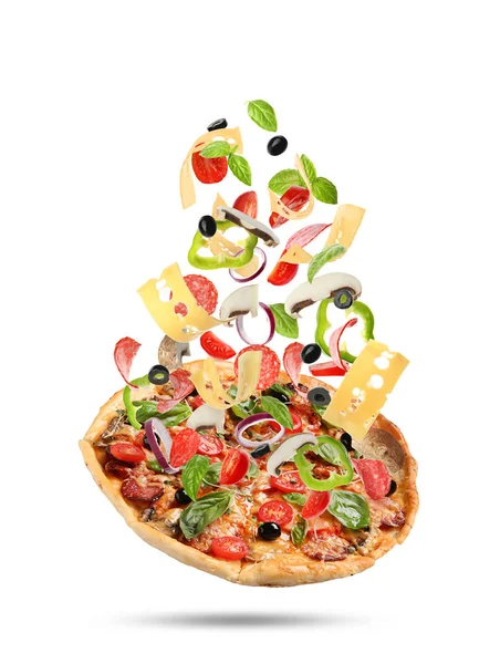 Delicious pizza with flying ingredients on white background