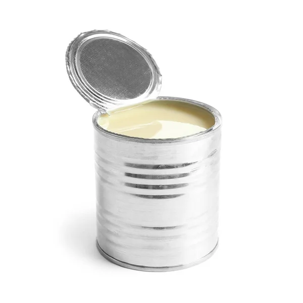 Tin can with condensed milk on white background. Dairy product — ストック写真