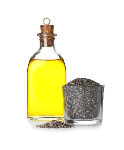 Bottle of chia oil and glass with seeds on white background — Stock Photo, Image