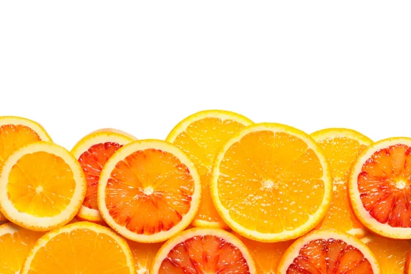 Szelet friss citrusfélék, a fehér háttér, felülnézet — Stock Fotó