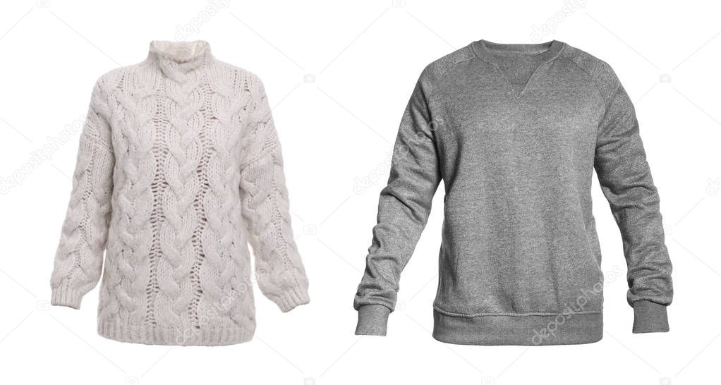 Set of different stylish warm sweaters on white background