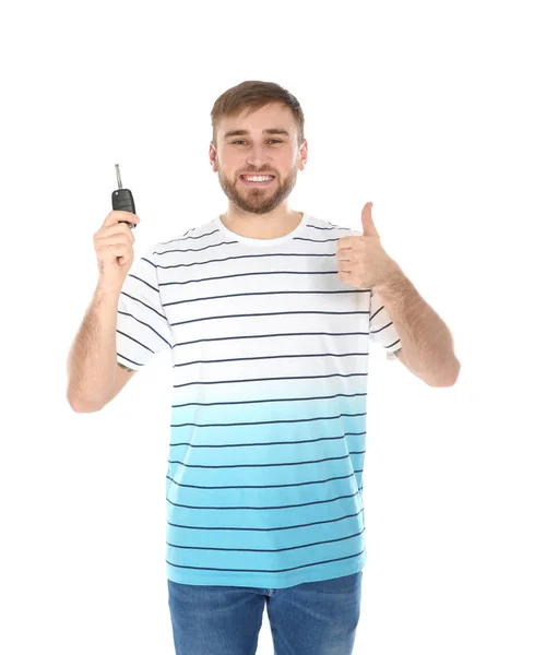 흰색 바탕에 자동차 키와 함께 행복 한 젊은 남자. 운전 면허증을 얻기 — 스톡 사진