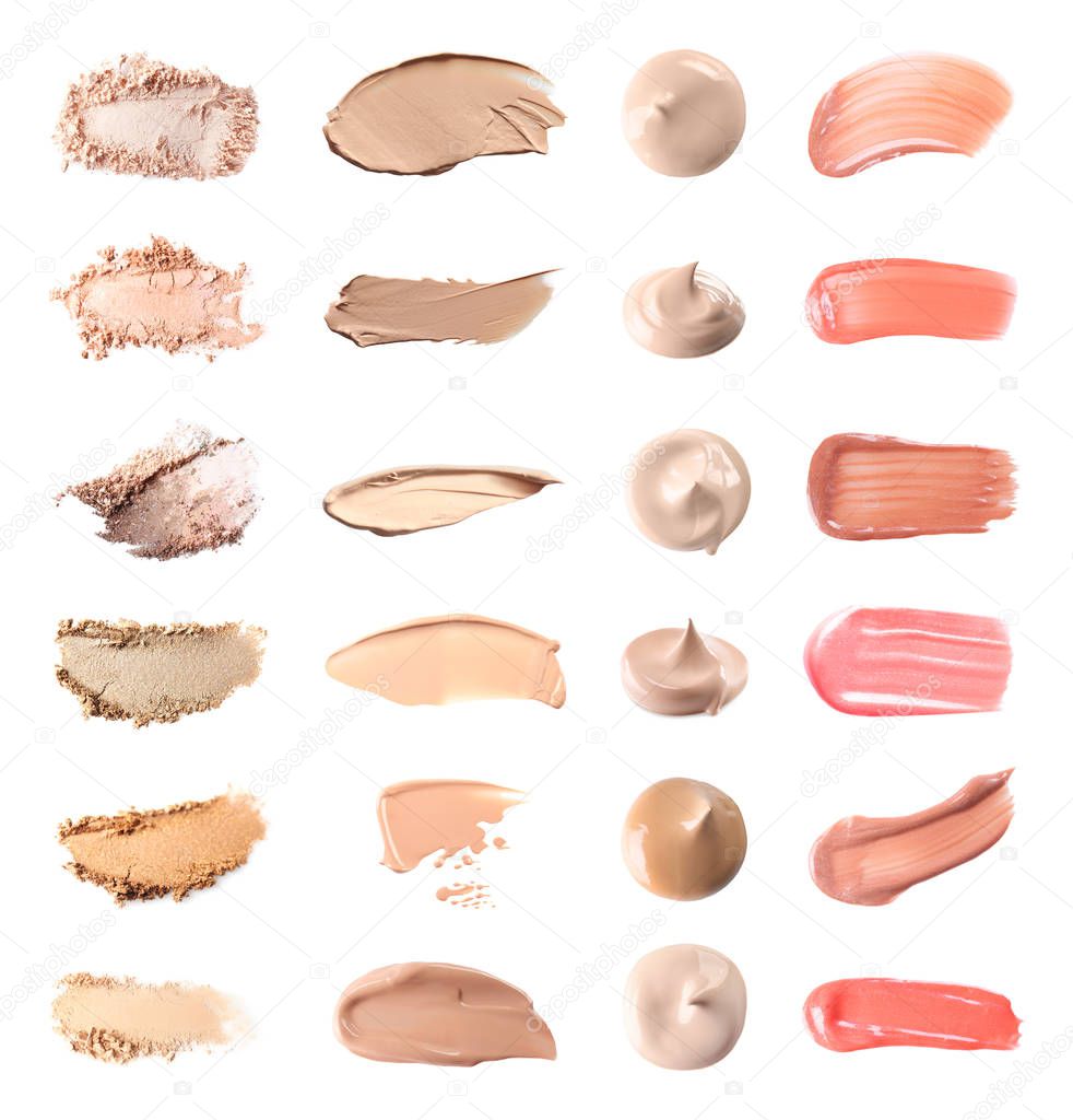 Set with swatches of lipsticks, eye shadows and skin foundations on white background, top view