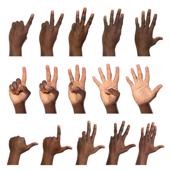 Afro-amerykański człowiek pokazując różne gesty na białym tle, zbliżenie widok rąk — Zdjęcie stockowe