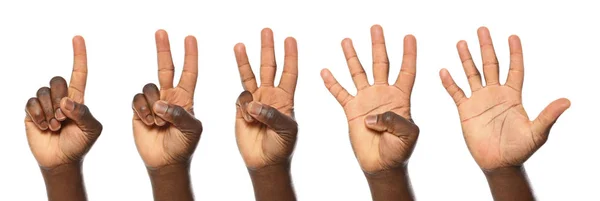 Afro-American man showing different gestures on white background, closeup view of hands — Stock Photo, Image