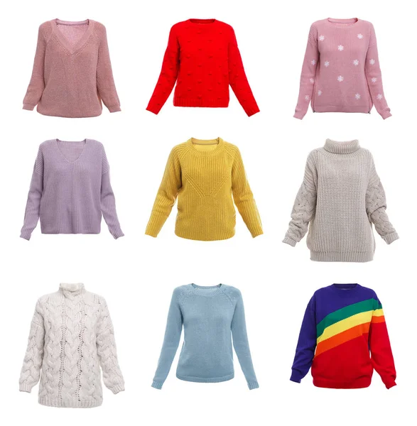 Conjunto de diferentes camisolas quentes elegantes no fundo branco — Fotografia de Stock