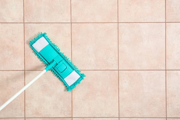 Cleaning of floor with mop, top view. Space for text — Stock Photo, Image