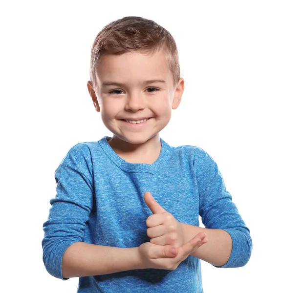 Niño pequeño mostrando gesto AYUDA en lenguaje de señas sobre fondo blanco — Foto de Stock