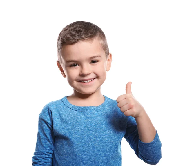 Muchacho mostrando el gesto de THUMB UP en lenguaje de señas sobre fondo blanco —  Fotos de Stock