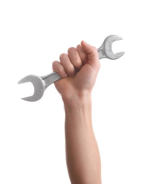 Beyaz üzerinde izole anahtar tutan adam. İnşaat aletleri