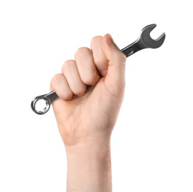 Adam tutan kombinasyon anahtarı beyaz üzerinde izole, closeup. Sıhhi tesisat araçları