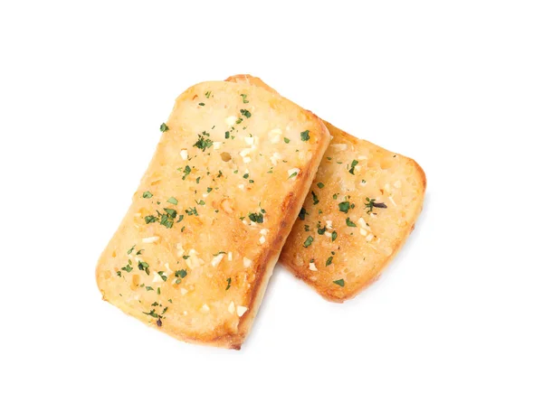 Kromki pysznego chleba czosnkowego z ziołami na białym tle — Zdjęcie stockowe