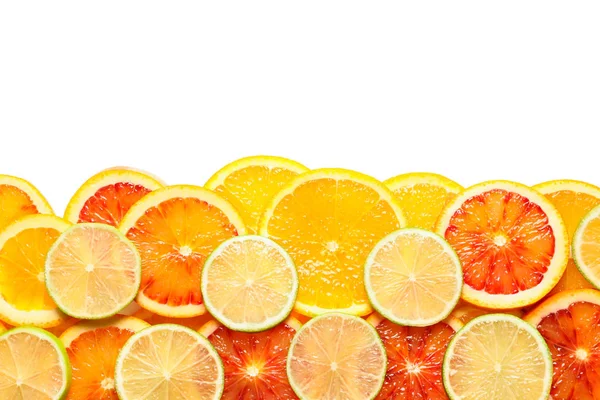 Olika citrus frukter på vit bakgrund, uppifrån — Stockfoto